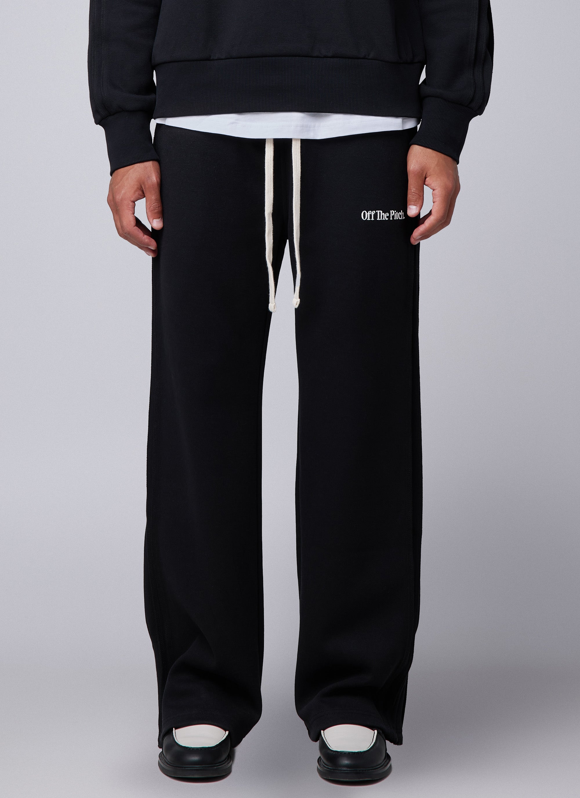 Pantalones con panel de borde sin rematar | Negro
