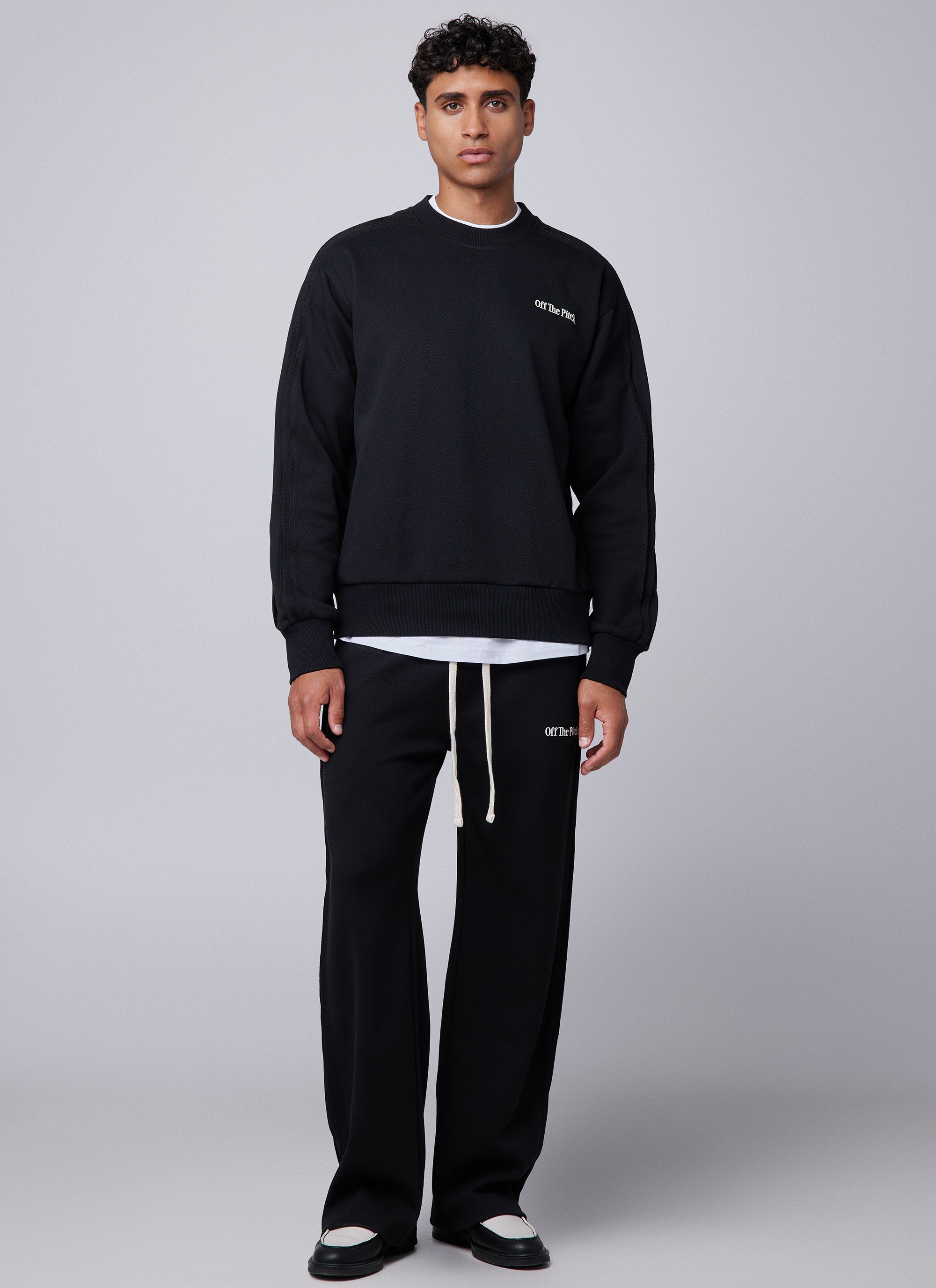 Pantalones con panel de borde sin rematar | Negro